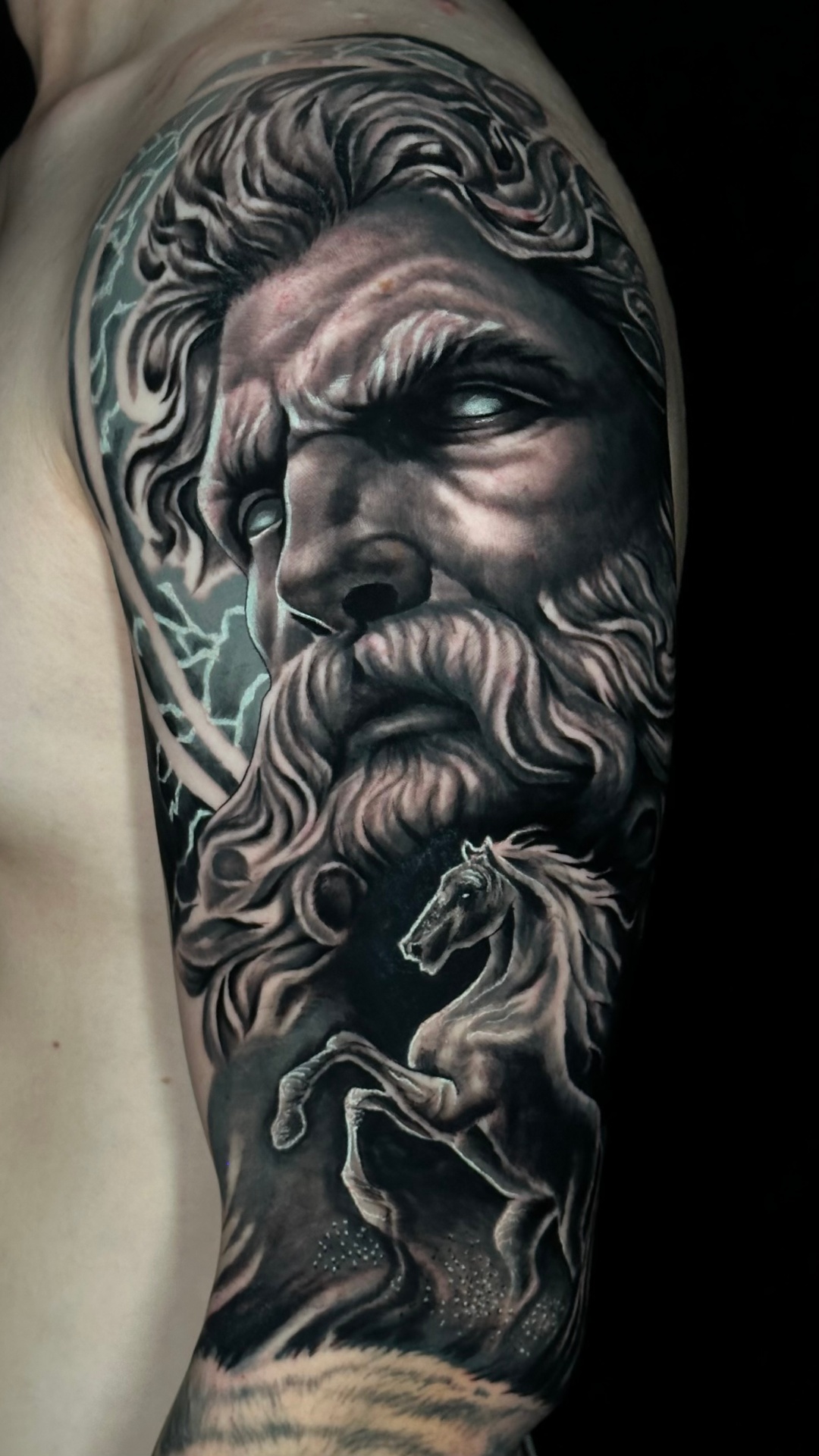 Black and grey Zeus and Pegasus half sleeve tattoo